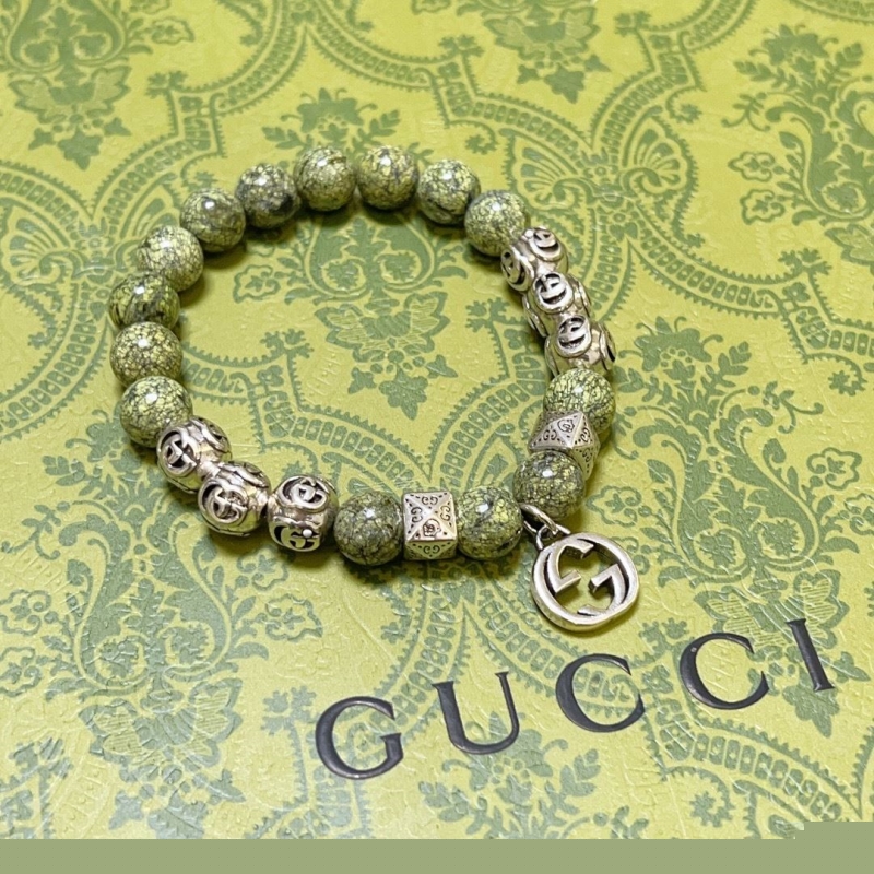 G*u*i bracelets